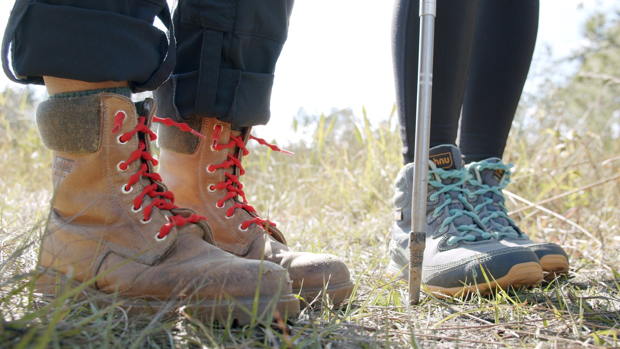 Red No-Tie Laces brown hightop work boots and light blue no-tie shoelaces on hiker boots